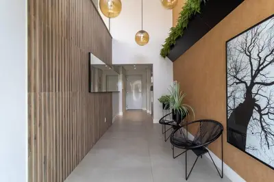 Uma televisão e/ou sistema de entretenimento em Edifício San Diego em Bombas - SC