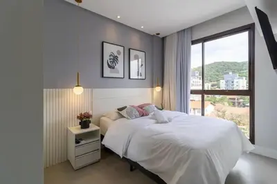 Uma cama ou camas num quarto em Edifício San Diego em Bombas - SC