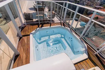 Uma varanda ou terraço em Condomínio Vila do Centro Bombinhas