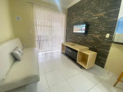 Uma televisão e/ou sistema de entretenimento em 107- Apartamento c/ patio e piscina privada Bombas