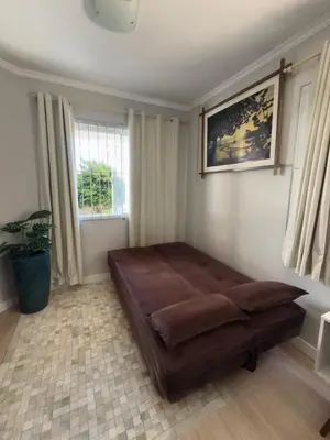 Uma cama ou camas num quarto em Apto Praia de Bombas - 4 pessoas