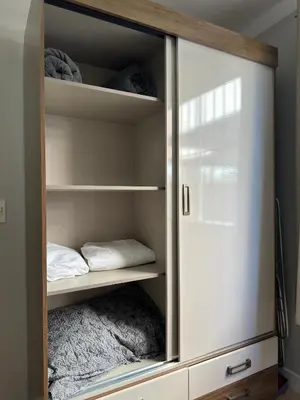 Uma cama ou camas num quarto em Apto Praia de Bombas - 4 pessoas