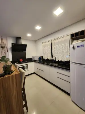 A cozinha ou kitchenette de Casa Sunstay Garden com piscina