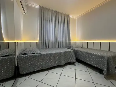 Uma cama ou camas num quarto em B028 - Cobertura com vista para o mar em Bombinhas