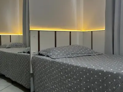 Uma cama ou camas num quarto em B028 - Cobertura com vista para o mar em Bombinhas