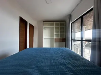 Uma cama ou camas num quarto em B028 - Cobertura com vista para o mar em Bombinhas