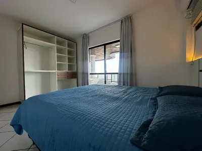 Uma cama ou camas num quarto em B028 - Cobertura com vista para o mar em Bombinhas