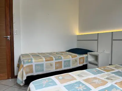 Uma cama ou camas num quarto em B029 - Cobertura com 3 quartos e vista para o mar