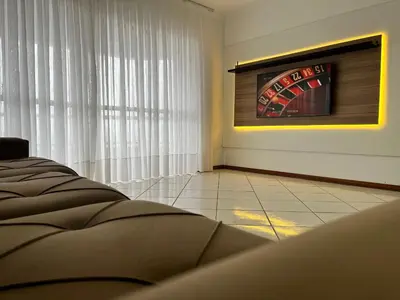 Uma televisão e/ou sistema de entretenimento em B029 - Cobertura com 3 quartos e vista para o mar