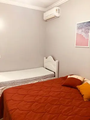 Uma cama ou camas num quarto em Aconchego do Mar