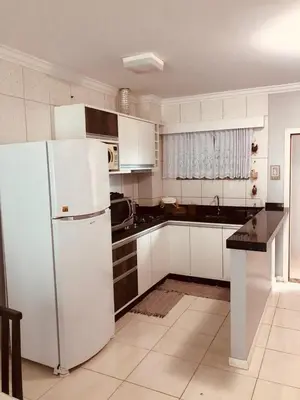 A cozinha ou kitchenette de Aconchego do Mar