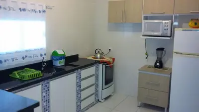 A cozinha ou kitchenette de Casa Bombinhas temporada