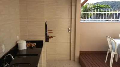 Uma varanda ou terraço em Casa Bombinhas temporada