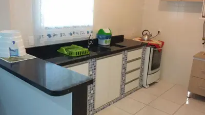 A cozinha ou kitchenette de Casa Bombinhas temporada
