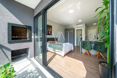 Uma varanda ou terraço em 205- Studio com piscina em Bombas