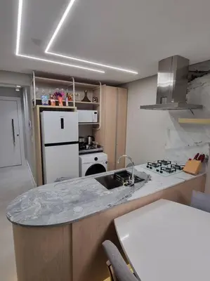 A cozinha ou kitchenette de Lindo apto Frente MAR tudo novinho 2suítes+garagem