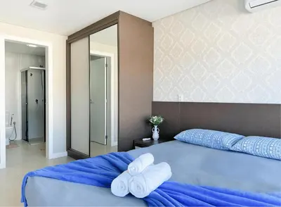 Uma cama ou camas num quarto em Cobertura com Jacuzzi em Palmas - GCR001