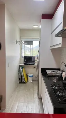 A cozinha ou kitchenette de Bella praia bloco E 42