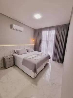 Uma cama ou camas num quarto em Privillege Residence 02