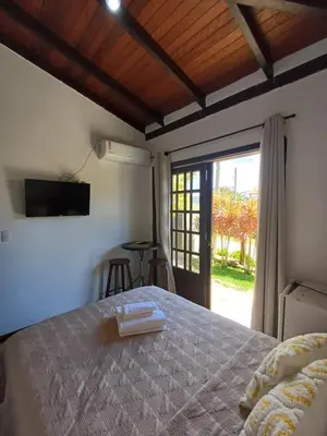 Uma cama ou camas num quarto em Suíte Campeira