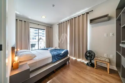 Uma cama ou camas num quarto em 203- Apart com vista mar e piscina
