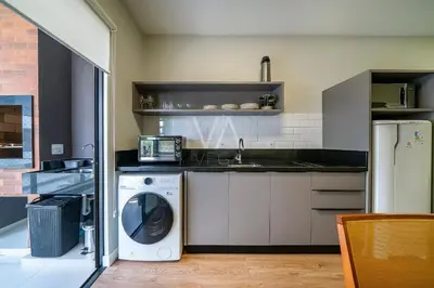 A cozinha ou kitchenette de 201- Apart com vista ao mar e piscina em Bombas