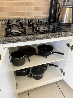 A cozinha ou kitchenette de Residencial Golfinho - Palmas, Apto 03