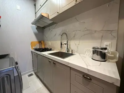 A cozinha ou kitchenette de Paraíso em Palmas com Piscina - 3 min do mar a pé!