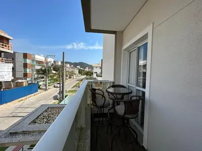 Uma varanda ou terraço em Apartamento confortável com piscina