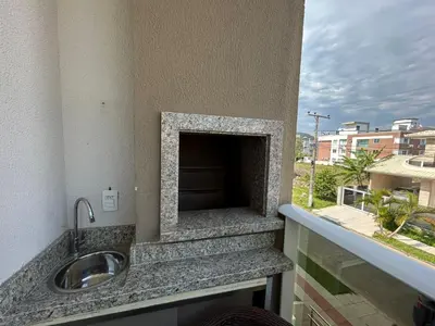 Uma varanda ou terraço em Apartamento confortável com piscina
