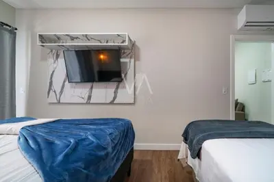 Uma cama ou camas num quarto em 207- Apart Villa Francione com piscina Bombas