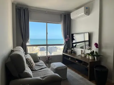 Uma televisão e/ou sistema de entretenimento em Apartamento dos Sonhos - 50m do mar