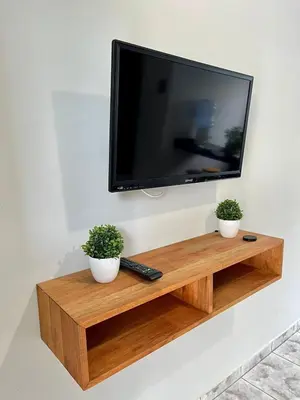 Uma televisão e/ou sistema de entretenimento em Férias de Verão