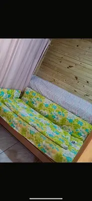 Uma cama ou camas num quarto em Bombinhas, Casa mobiliada 1 quarto