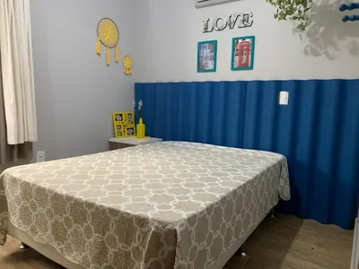 Uma cama ou camas num quarto em Apartamento casa Joel