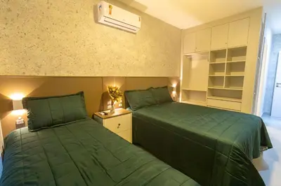 Uma cama ou camas num quarto em Solar do Atlântico 108 – Beira Mar em Bombas