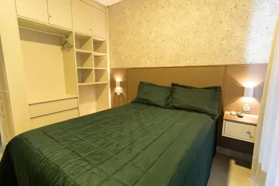 Uma cama ou camas num quarto em Solar do Atlântico 108 – Beira Mar em Bombas