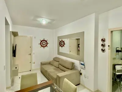 Uma área de estar em APARTAMENTO PRAIA BOMBINHAS