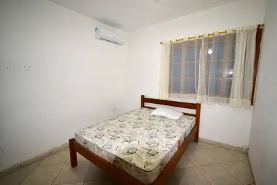 Uma cama ou camas num quarto em Casa Içara - 4 quartos - piscina