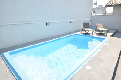 A piscina em ou perto de Casa Içara - 4 quartos - piscina