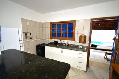 A cozinha ou kitchenette de Casa Içara - 4 quartos - piscina