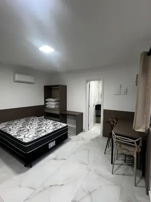 Uma cama ou camas num quarto em Residencial Bernardo