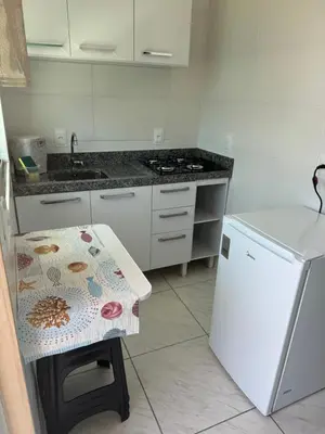 A cozinha ou kitchenette de Residencial Lara 10