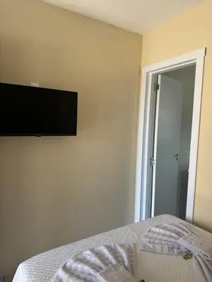 Uma televisão e/ou sistema de entretenimento em Residencial Lara 10