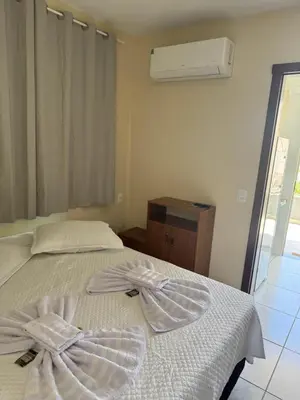 Uma cama ou camas num quarto em Residencial Lara 10
