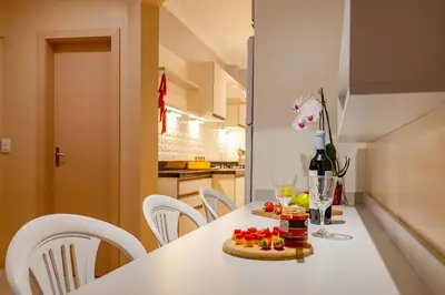 A cozinha ou kitchenette de Loft Aconchegante em Condomínio com Piscina