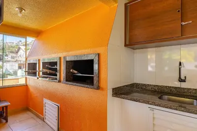 A cozinha ou kitchenette de Loft Aconchegante em Condomínio com Piscina
