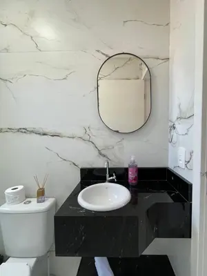 Uma casa de banho em Apto palmas- 3 quartos com churrasqueira
