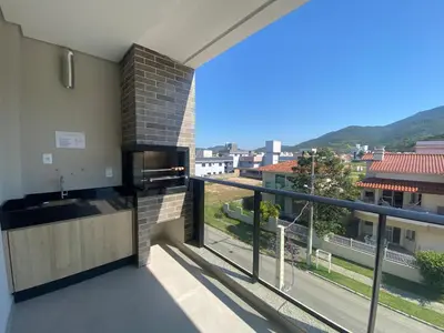 A planta de Lindo Apartamento na Praia de palmas