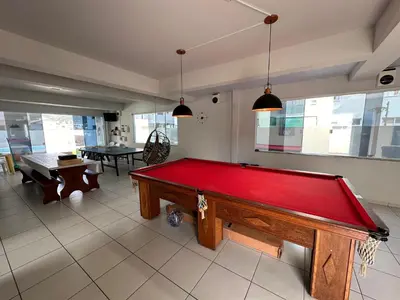 Uma mesa de bilhar em minhacasapraiapalmas istag 4 suítes 30 hosp a combinar